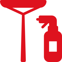 A red icon of a squeegee and spray bottle, representing cleaning supplies like those used in carpet cleaning services, displayed on a light gray background.